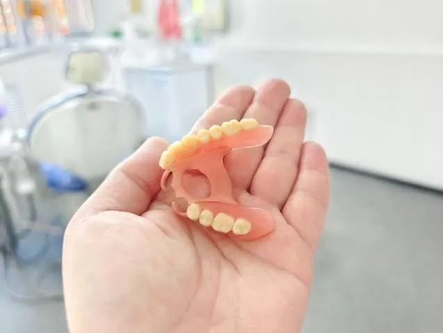 Partial and complete dentures