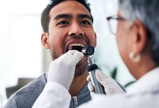Oral cancer screening examination at Revive Dental, Vajarahalli, Banashankari 6th Stage